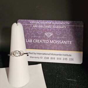 Lab created Moissanite and sterling silver ring. Size 8
